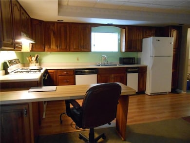 Closer view of the updated fully equipped kitchen.