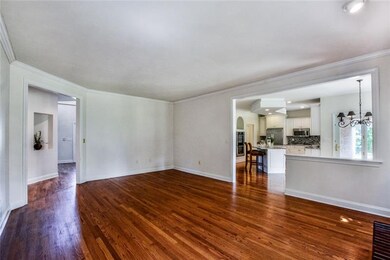 The family room is open to the kitchen creating a 