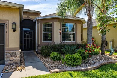 SCREENED FRONT PORCH, GUTTERS, SLIDING SCREEN GARAGE DOOR, AND STONE EDGING PLANTER WITH RIVER ROCK GROUND COVRING, NEW PLANTS, PARTIAL NEW SOD FOR GREAT CURB APPEAL!