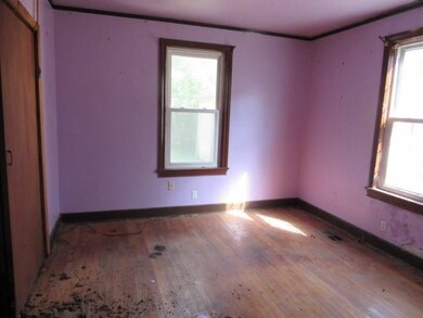 Spare room with light wood-type flooring and a wea