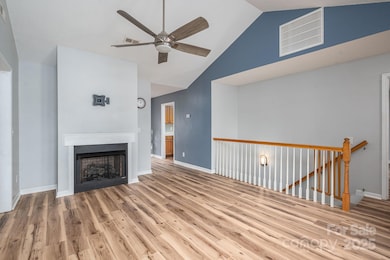 Living room with vaulted ceilings 