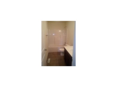 Bathroom. Picture is of similar unit.  Buyer to se