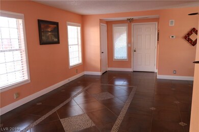 Picture showing the front entry door. Adjacent is