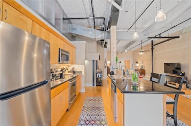 Kitchen with appliances with stainless steel finis