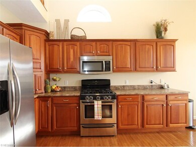 Cherry Cabinets, Stainless Steel Appliances