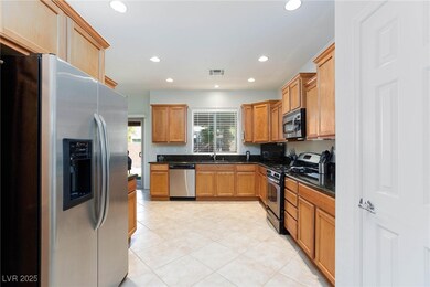 Kitchen featuring appliances with stainless steel