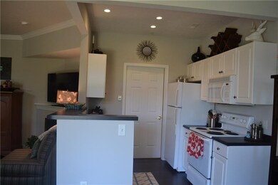 The kitchen provides plenty of storage space while