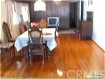 Large dining/family room with hardwood floors