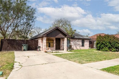 View of front of property with a front yard