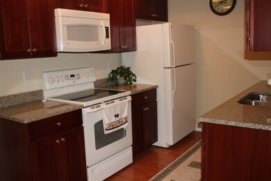 Granite countertops, high end appliances, all in like-new condition.