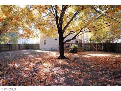 Exterior Front - View from back of yard.  Full fen