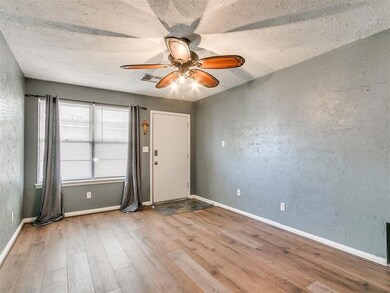 Spare room featuring hardwood / wood-style floors,