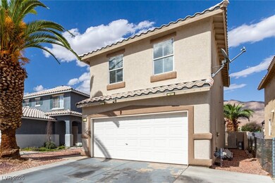 Mediterranean / spanish home with driveway, fence,