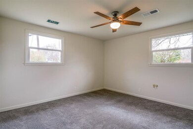 Bedrooms have carpet and Hunter ceiling fans.