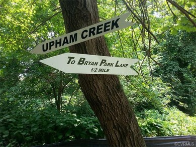 Backyard tree by Upham Creek shows how close Bryan Park is!