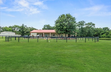 Front yard is fenced in 4’ no-climb horse fencing