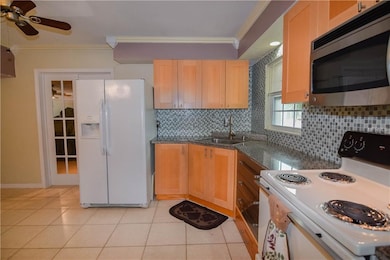 Kitchen with tile back splash