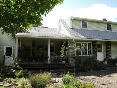 REAR OF MAIN HOUSE. OFFERS PORCH WITH ENTRY INTO T