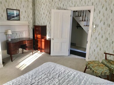 Additional view of bedroom down stairs off main ha