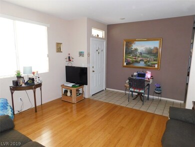 Enter into this formal living area w/custom floori