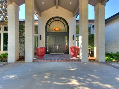 A stunning double-door entry warly welcomes your f