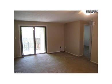 Living room with sliders to the porch and private 