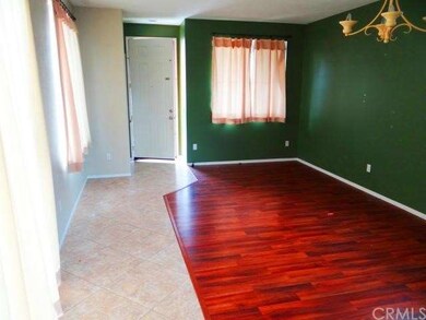 Family room, laminate flooring @ 18 inch tile with
