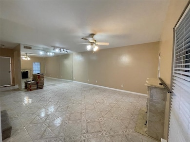 Spacious Living Area with Tile Flooring