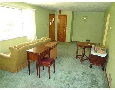 Living Room. FRONT ENTRANCE AND GUEST CLOSET.