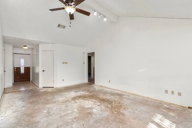Living room with view to entry.