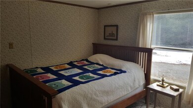Large window in the first bedroom