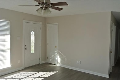 Front living room with new vinyl plank flooring (t