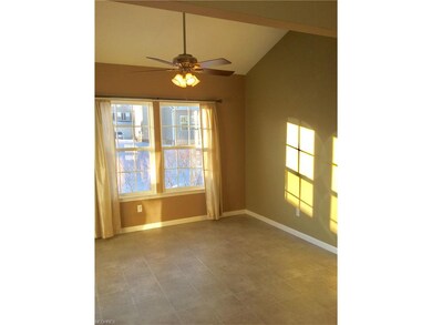 Morning room with vaulted ceiling, ceiling fan and