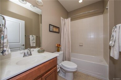 1st Level Full Bath w Tile Surround and Tile floor