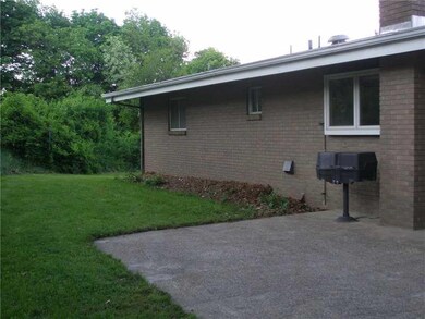 Patio/Deck. Concrete patio in backyard.