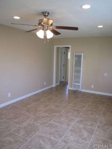 Living room with custom tile flooring