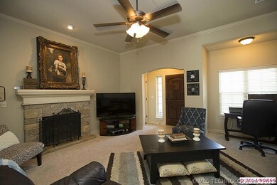 Lovely stone fireplace with wood mantle for those
