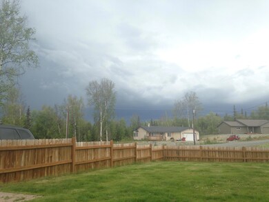 Fenced .9 Acre yard