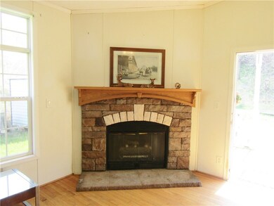 Fireplace is in the den. The French Door leads out