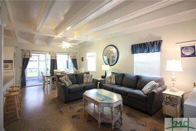 Light bright great room with coffered ceiling and 