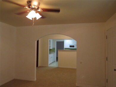 View from living room into dining room and then ki
