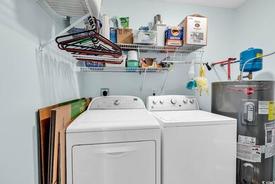 Washroom with washing machine and dryer, laundry a