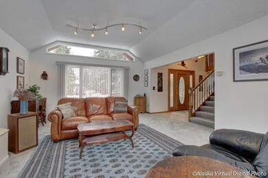 Living Room Boasts Large Picture Windows