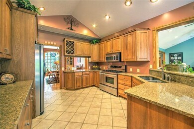 Double sink and breakfast bar with counter opening