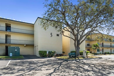 Your condo on the top floor, to the left of the building 5 elevator tower