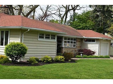 Exterior Front. Low maintenance landscaping.