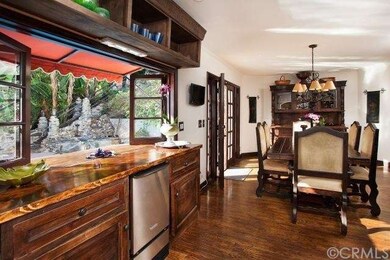 Tiki Bar which Opens to Patio and Pool Area