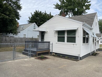 FENCE WITH GATE, DECK AND PATIO AREA