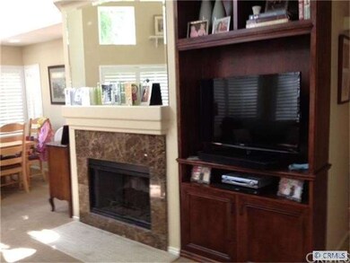 Perfect Built-in next to marble fireplace