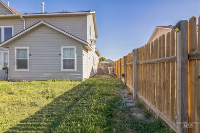 View of side of property featuring a fenced backyard and a central air condition unit